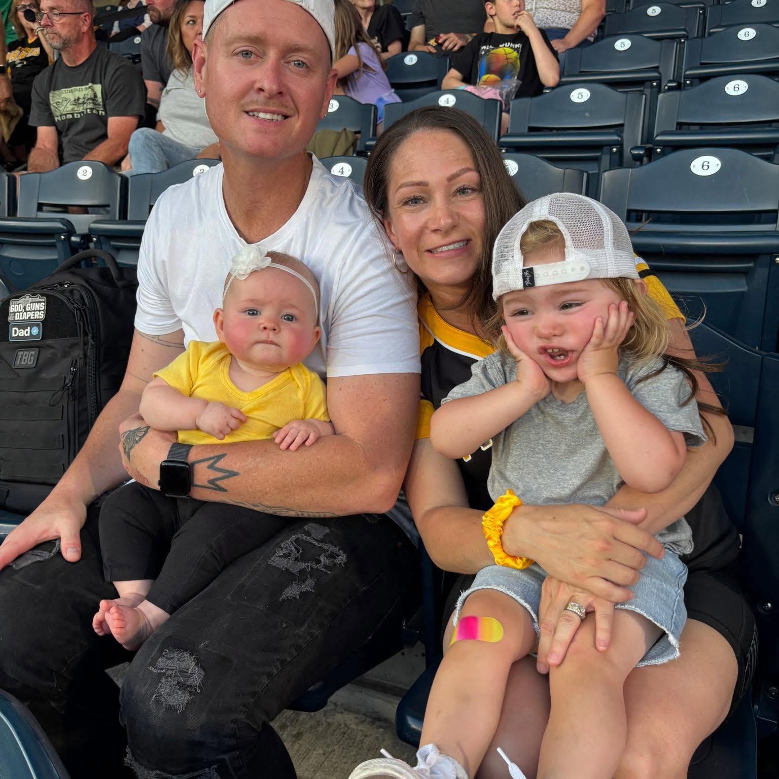 The owner of Studio Triple 7 with his family at a Pittsburgh Pirates game